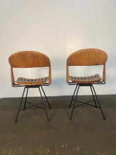 A pair of Arthur Umanoff Swiveling side chairs - 4812340