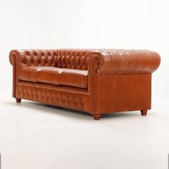 A pair of Chesterfield style leather sofas  - 4125352