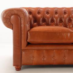 A pair of Chesterfield style leather sofas  - 4125353