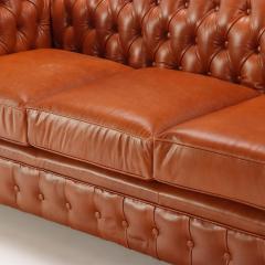 A pair of Chesterfield style leather sofas  - 4125355