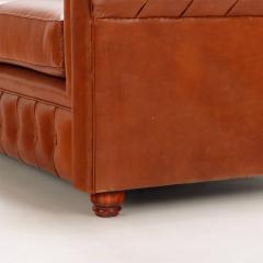 A pair of Chesterfield style leather sofas  - 4125356