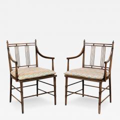 A pair of English Regency style faux bamboo armchairs with cane seats 19th C  - 3012795