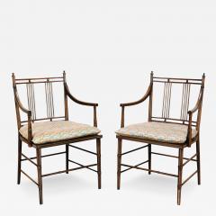 A pair of English Regency style faux bamboo armchairs with cane seats 19th C  - 3012795