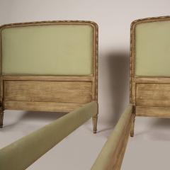 A pair of French Louis XVI style painted twin beds with upholstered headboards - 1886175