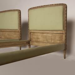 A pair of French Louis XVI style painted twin beds with upholstered headboards - 1886188