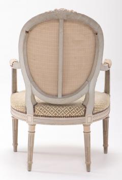 A pair of French Louis XVI style relief carved open armchairs circa 1860  - 3450467