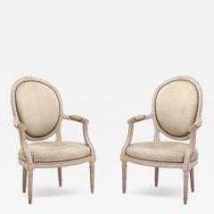 A pair of French Louis XVI style relief carved open armchairs circa 1860  - 3450674