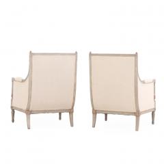 A pair of Louis XVI style partial gilt wood upholstered Berg re chairs C 1940  - 4492371