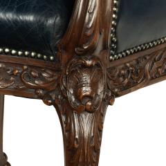 A pair of Victorian blue leather and walnut tub chairs - 3235276