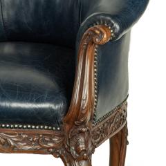 A pair of Victorian blue leather and walnut tub chairs - 3235277