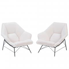 A pair of black iron frame club chairs with white upholstered seats  - 2629303