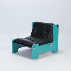 A pair of blue framed lounge chairs with black leather seats C 1970  - 2712424