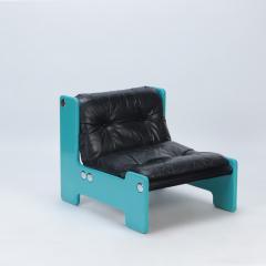 A pair of blue framed lounge chairs with black leather seats C 1970  - 2712425