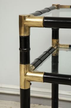 A pair of ebonized faux bamboo and brass tables in the manner of Billy Haines - 1188549