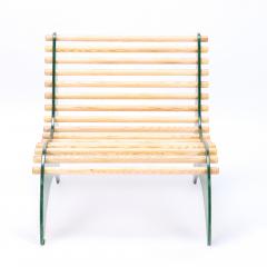 A pair of ergonomically shaped green framed chairs with oak rods  - 2325877