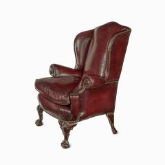 A pair of generous mahogany wing armchairs with shell carved knees - 3209328