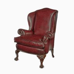 A pair of generous mahogany wing armchairs with shell carved knees - 3209330