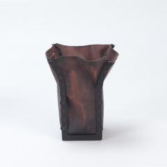 A pair of iron and leather waste baskets Contemporary - 2748782