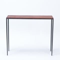 A pair of iron consoles with dark brown leather tops Contemporary - 2508822