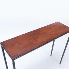 A pair of iron consoles with dark brown leather tops Contemporary - 2508825