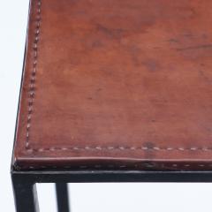 A pair of iron consoles with dark brown leather tops Contemporary - 2508826