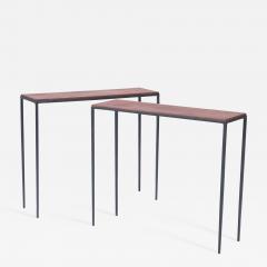 A pair of iron consoles with dark brown leather tops Contemporary - 2510333