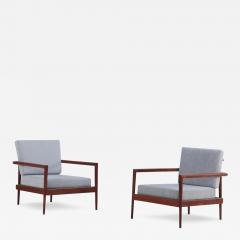 A pair of lounge chairs with Windsor style backs designed by Edmund Spence  - 3699212