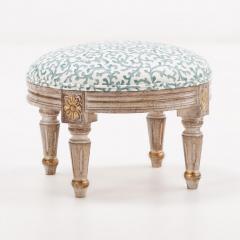 A pair of petite French Louis XVI style upholstered foot stools Contemporary  - 3782786