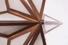 A pair of star shaped wall sconces made of brass and glass Italy 1960s - 3499286
