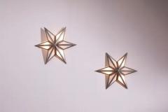 A pair of star shaped wall sconces made of steel and glass Italy 1960s - 3491946