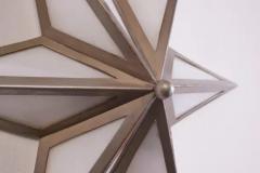 A pair of star shaped wall sconces made of steel and glass Italy 1960s - 3491948