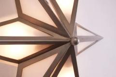 A pair of star shaped wall sconces made of steel and glass Italy 1960s - 3491949