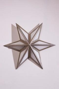 A pair of star shaped wall sconces made of steel and glass Italy 1960s - 3491952