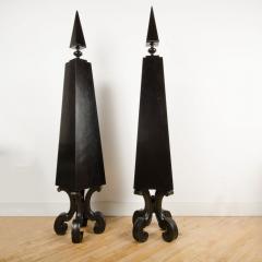 A pair of tall black decorative obelisks - 1832656