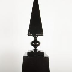 A pair of tall black decorative obelisks - 1832684