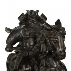 A powerful Japanese equestrian wood carving of a samurai by Yoshida Issen Isshun - 3320628
