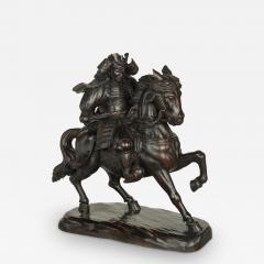 A powerful Japanese equestrian wood carving of a samurai by Yoshida Issen Isshun - 3323610