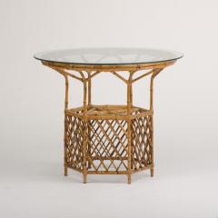 A rattan dining room table and four chairs circa 1950 - 1681184