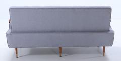 A restored sofa with floating wood arms and metal mounts circa 1960  - 3448449