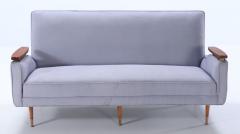 A restored sofa with floating wood arms and metal mounts circa 1960  - 3448450