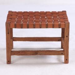 A rustic French wood bench with woven leather seat C 1930  - 4228581