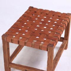 A rustic French wood bench with woven leather seat C 1930  - 4228582