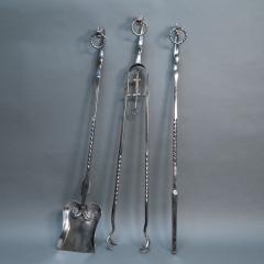 A set of Arts Crafts Cotswold School polished steel hand wrought fire utensils - 4188902