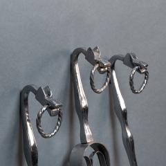 A set of Arts Crafts Cotswold School polished steel hand wrought fire utensils - 4188904