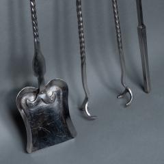 A set of Arts Crafts Cotswold School polished steel hand wrought fire utensils - 4188905