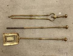 A set of brass fire tools - 1254933