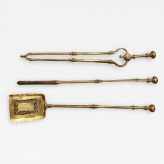 A set of brass fire tools - 1257118