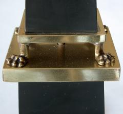 A sleek French 1940s black painted tole obelisk form lamp with brass mounts - 900109