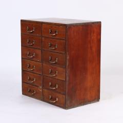 A solid mahogany twelve drawers chest with brass pulls circa 1960  - 2240080