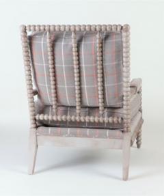 A spool framed chair with upholstered seat back cushion semi attached bolster - 2202982